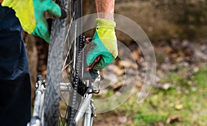 Man cleaning his bicycle for the new season