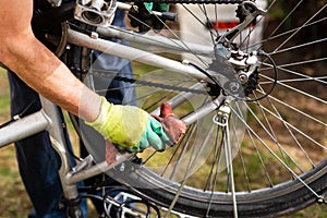 Man cleaning his bicycle for the new season