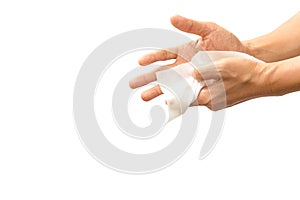 Man cleaning his hand with wet tissue isolated