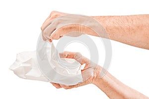 Man cleaning his hand with wet tissue isolated on white background