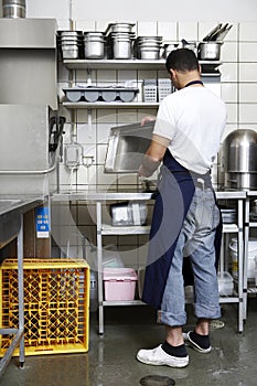 Man cleaning the kitchen