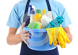 Man with cleaning supplies on white background, closeup