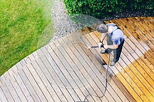 man cleaning terrace img