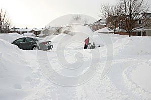 Man Clearing Driveway with Snowblower photo