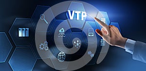 The man clicks on the inscription VTP. VLAN Trunking Protocol. Virtual Local Area Network