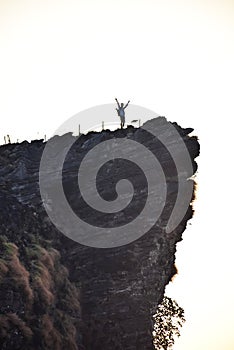 Man on cliff