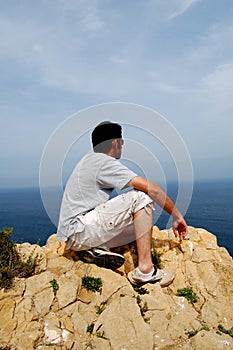 man on cliff top