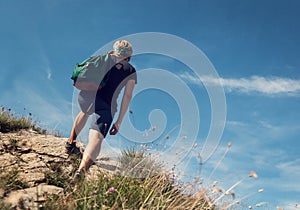 Man climb on mountain hill
