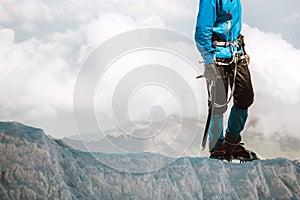 Man climbing on glacier to mountain summit Travel