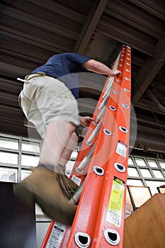Man Climbing a Ladder