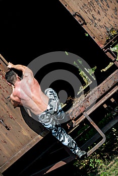 Man Climbing A Ladder