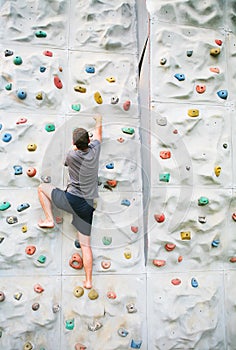 Man climbing a wall