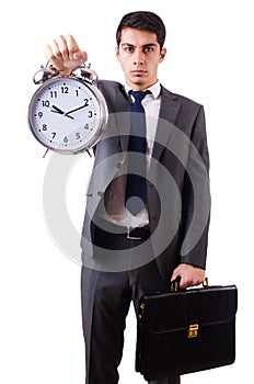 Man with clock afraid to miss deadline isolated