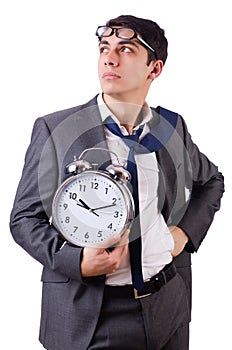 Man with clock afraid to miss deadline isolated