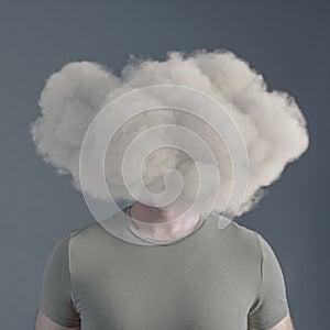 Man with cloud covering his face