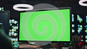 IT man coding green screen pc at datacenter closeup. Developer programming code
