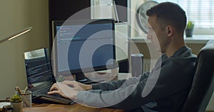 Man coding html and programming on screen Monitors, development web, developer.