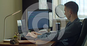 Man coding html and programming on screen Monitors, development web, developer.