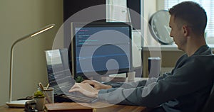 Man coding html and programming on screen Monitors, development web, developer.