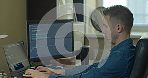 Man coding html and programming on screen Monitors, development web, developer.