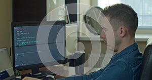 Man coding html and programming on screen Monitors, development web, developer.