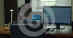 Man coding html and programming on two screen Monitors, development web, developer.