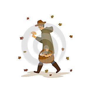 Man collecting mushrooms, walking with basket under the falling autumn leaves