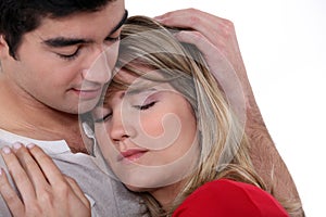 Man comforting girlfriend