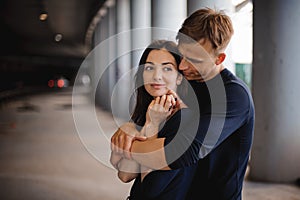 Man comforting his woman outdoor