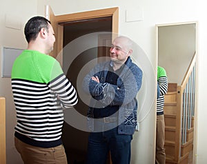 Man coming to visit his friend