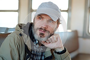 Mature man in a empty  commuter train