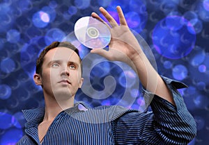 Man with compact disc