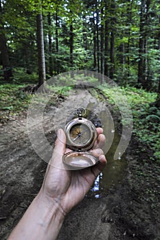 Man with compass in hand