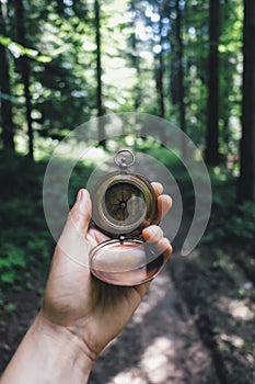 Man with compass in hand