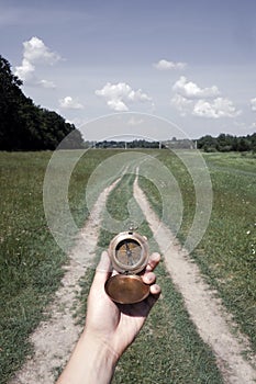 Man with compass in hand