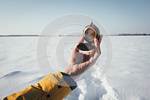 Man with compass in hand