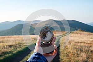 Man with compass in hand