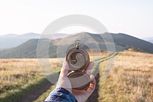 Man with compass in hand