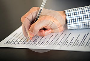 Man completing a questionnaire photo