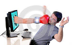 Man with computer hit by boxing glove