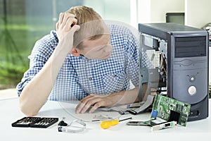 Man during computer reparation