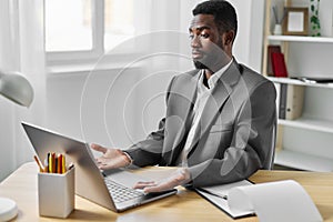 man computer student american office education job freelancer online laptop worker african