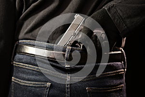 The man concealing gun