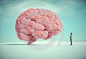 The man and conceptual image of a large  shape of the human brain
