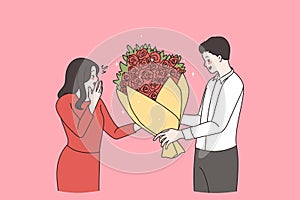 Man congratulate give flowers to woman lover