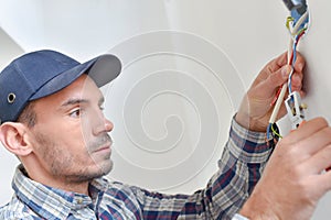 man connecting cables