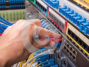 Man connecting network cable