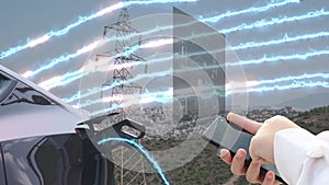 A man connects an electric car to a charger and Power Transmission Lines in the background. Overload in the electrical