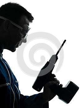 Man construction worker holding drill silhouette