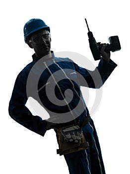 Man construction worker holding drill silhouette